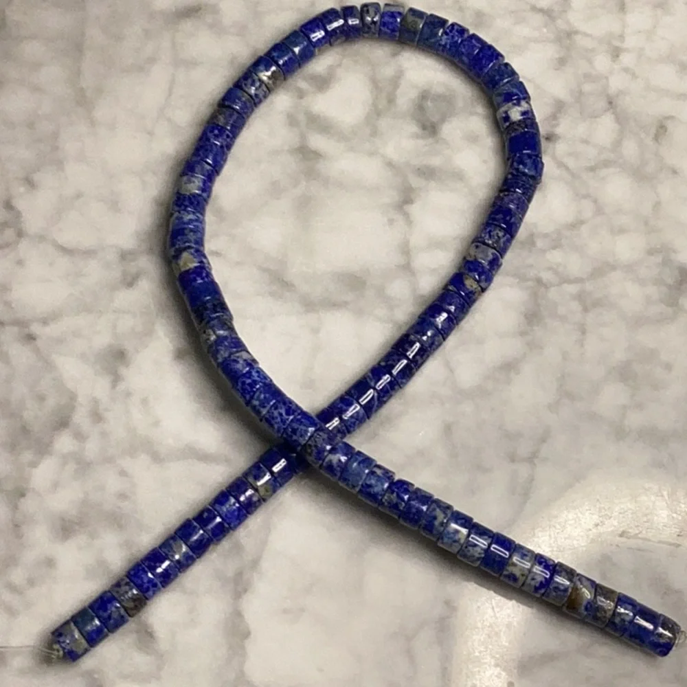 Bead, lapis lazuli (natural), 8x4mm heishi - Picture 2 of 2